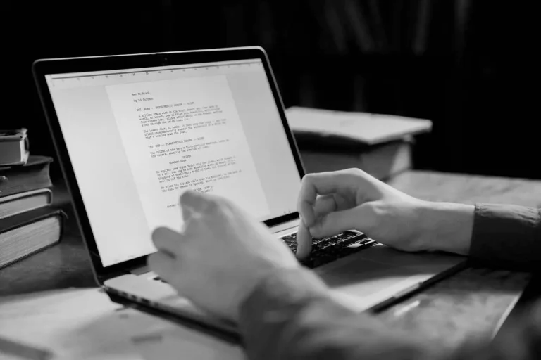 image of a copywriter drafting website and ad copy on a laptop