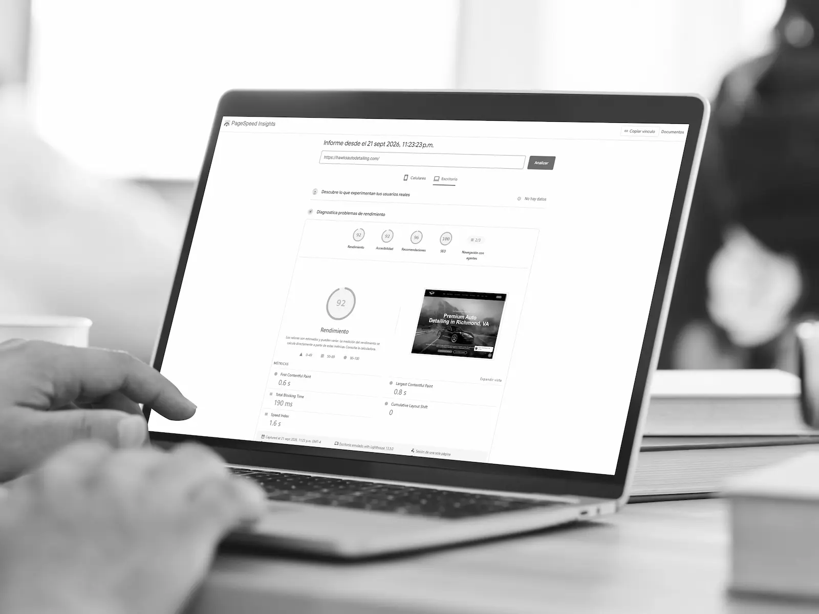 image of a developer reviewing website performance data on a monitor